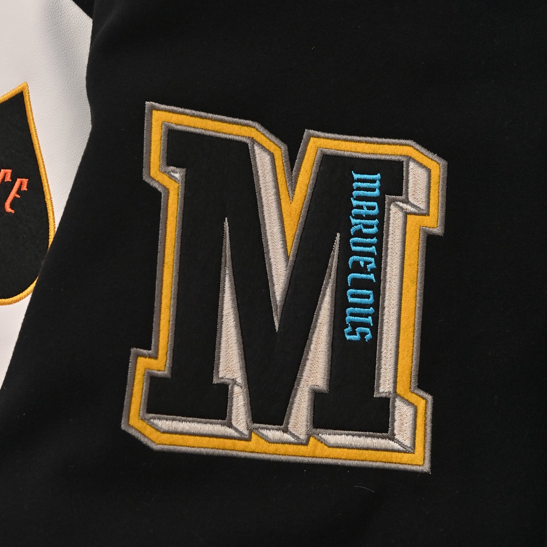 袖PUスタジアムブルゾン