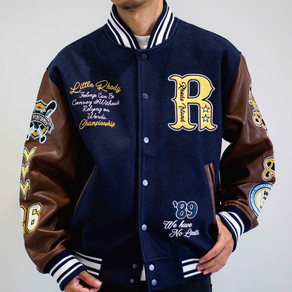 リブ襟ドット釦ベースボール袖PUスタジアムブルゾン（254-2027）