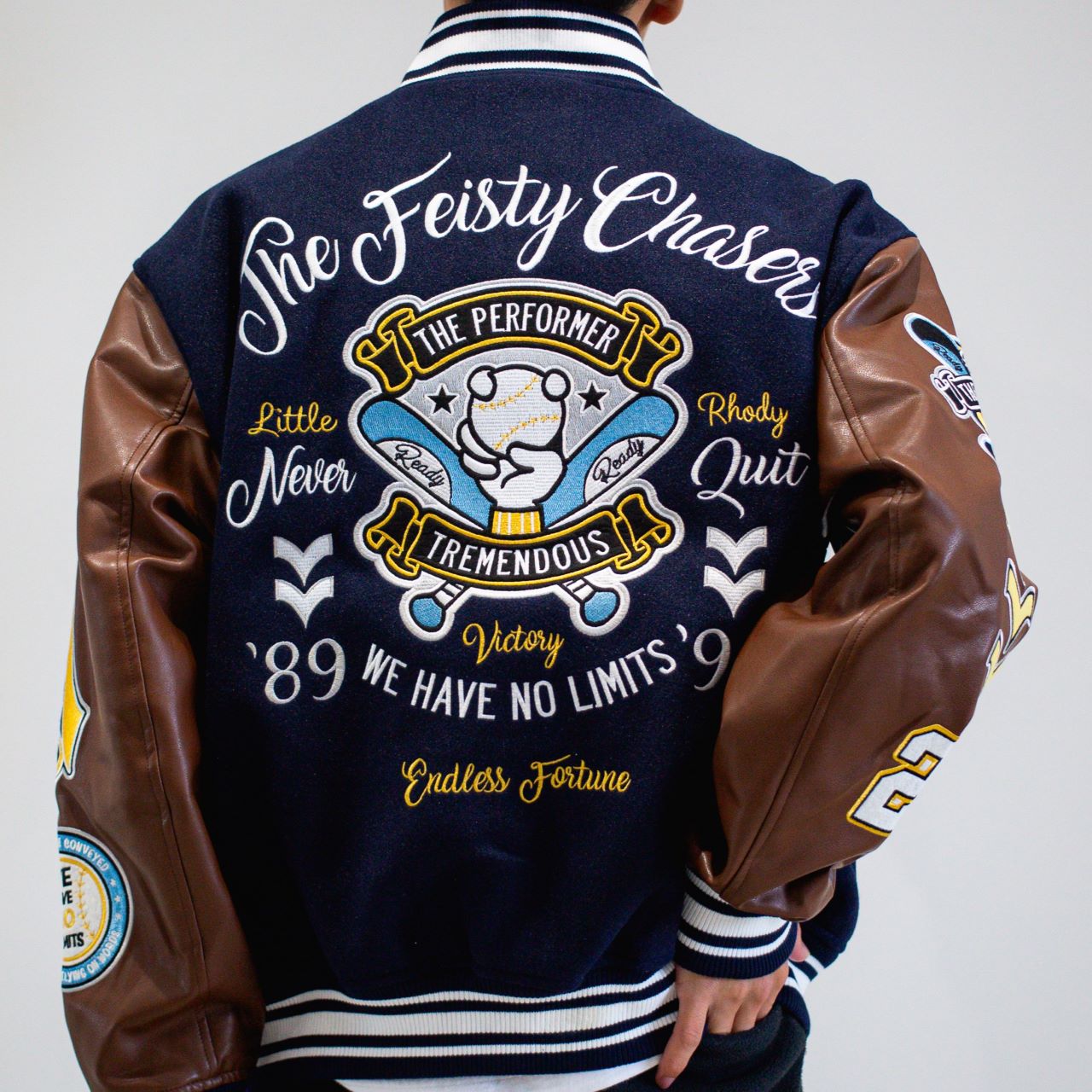 リブ襟ドット釦ベースボール袖PUスタジアムブルゾン（254-2027）